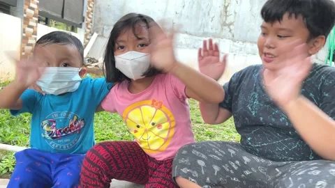 Three Asian Kids Looking At The Camera Smiling Stock Footage 156326811