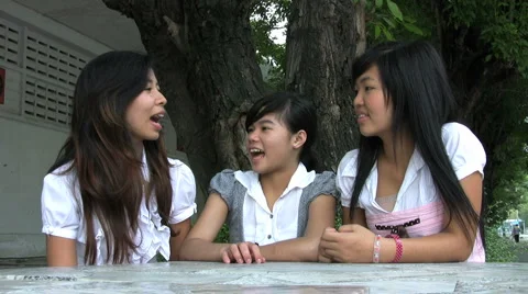 Three Asian Students Hanging Out Stock Footage