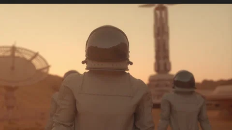 Three Astronauts in Space Suits Confidently Walking on Mars. Mars Colonization Video stock 154611803