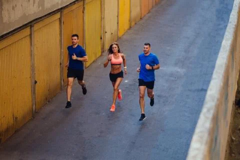 Three athletes jogging Foto stock