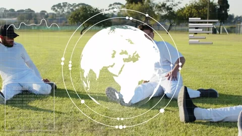 Three athletes shifting on grass reacting to animated globe appearing and Stock Footage 333648560