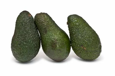Three avocados Stock Photos