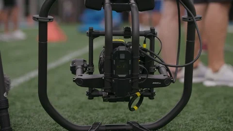 Three axis gimbal on artificial turf Stock Footage 103876536