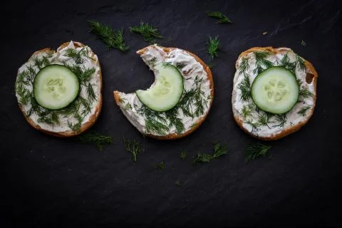 Three Bagels with a Bite Stock Photos