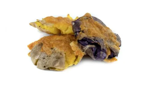 Three baked smashed multicolored potatoes close up Stock Photos
