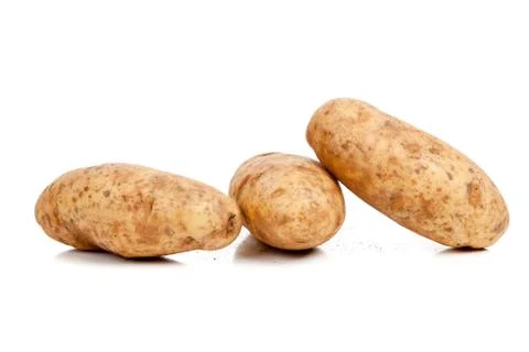 Three baking potatoes on white Stock Photos