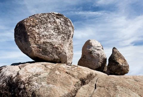 Three balanced boulders Stock Photos
