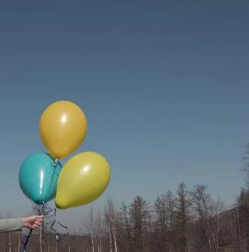 Three balloons of different colors Stock Photos