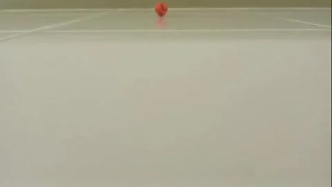 Three balls are rolling on the floor Stock Footage 322082710