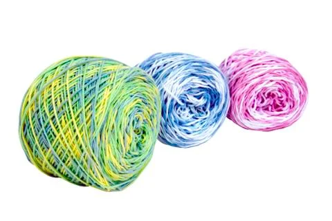 Three balls of bright multi-colored crochet cotton Stock Photos
