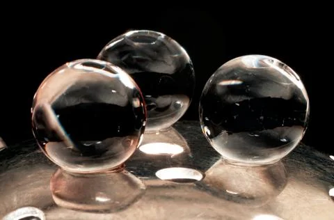 Three balls in gray Stock Photos