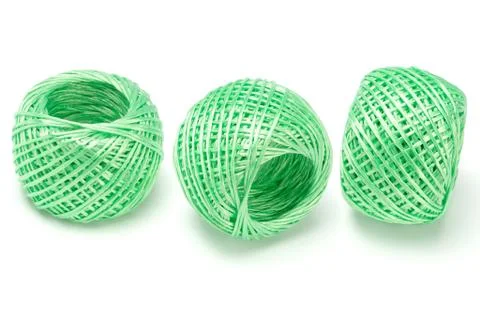 Three balls of green nylon string Stock Photos
