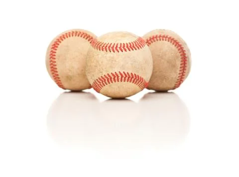 Three Baseballs Isolated on a Reflective White Background. Stock Photos