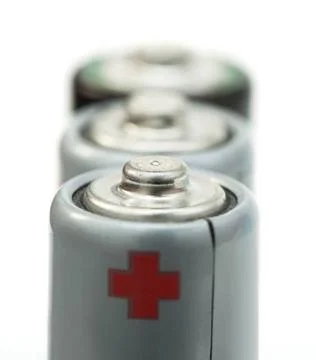 Three batteries close up Three batteries close up. White isolated studio s... Foto stock