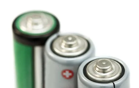 Three batteries close up Three batteries close up. White isolated studio s... Foto stock