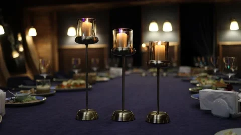 Three beautiful candles on the table Stock Footage 173296198