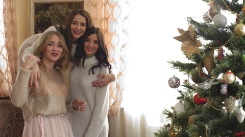 Three beautiful sisters posing for the camera and smiling Stock Footage 73535428