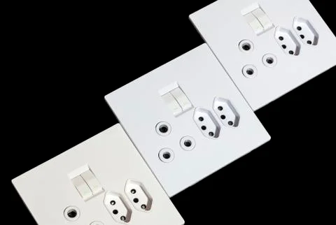 Three Beige and White Multipurpose Wall Mount Sockets Stock Photos