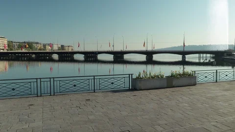 Three bicycles alone on Mont Blanc bridge, Geneva - 4K Stock Footage 129522085