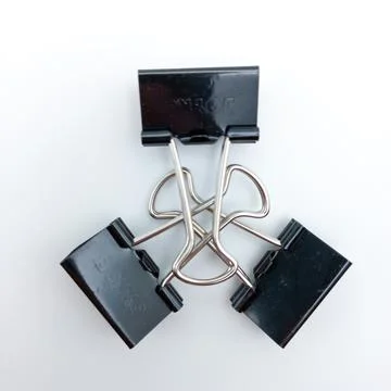 Three Binder Clips Closing Each Other Isolated On White Background Stock Photos