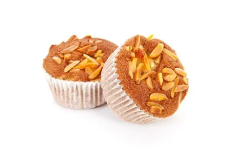 Three biscuit cupcakes with nuts Stock Photos