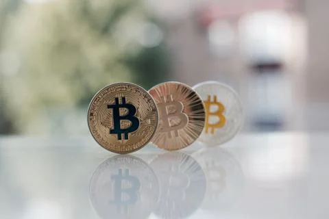 Three bitcoins Stock Photos