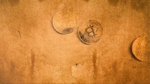Three bitcoins sliding across a table old effect background  Stock Footage 85690864