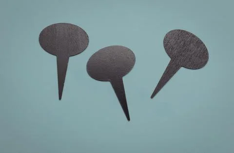 Three black blank speech bubbles on blue background Stock Photos
