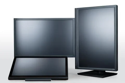 Three black computer monitors isolated on white with clipping path Foto stock