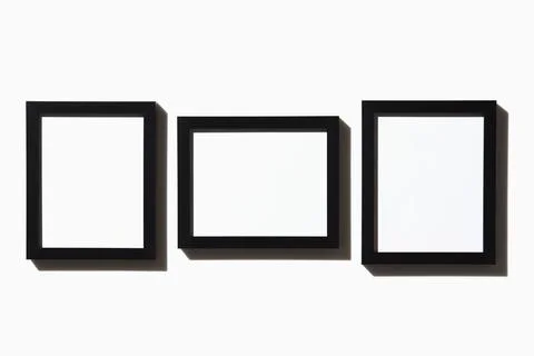 Three black picture frames on white background 库存照片