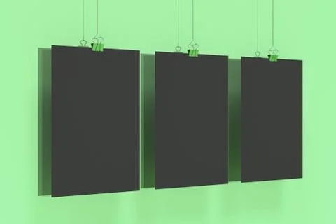 Three blank black posters with binder clip mockup on green background Stock Illustration