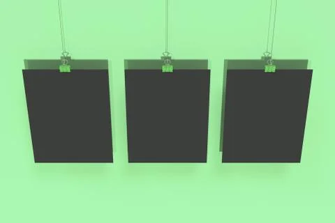 Three blank black posters with binder clip mockup on green background Stock Illustration