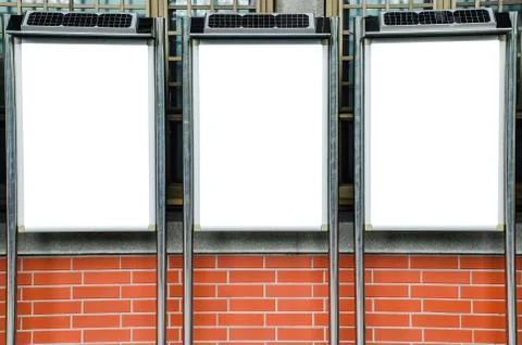 Three blank picture frames on brick wall, Template Mock up for your content. Stock Photos