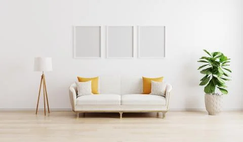 Three blank poster frame in bright modern living room with white sofa, floor  Stock Photos