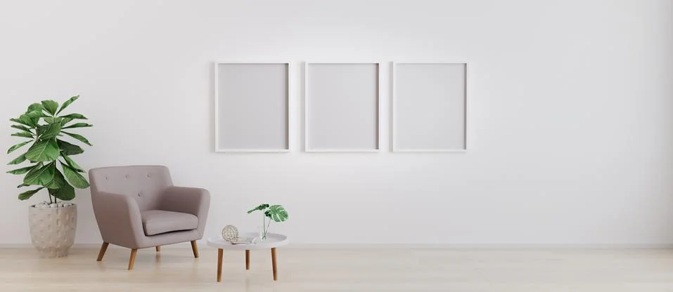 Three blank poster frame in bright room with white wall and moderm furniture  Stock Photos