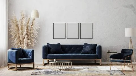 Three blank poster frames on gray wall mockup in modern luxury interior de... Stock Photos