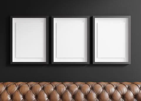 Three blank vertical picture frames hanging on black wall. Template, mock up for Stockillustratie