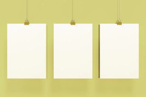 Three blank white posters with binder clip mockup on yellow background Stock Illustration
