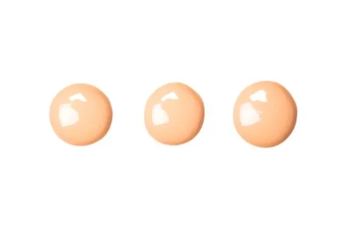 Three blots of foundation Stock Photos