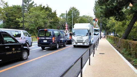 Three blue buses with the red siren in Tokyo Japan Stock Footage 121373145
