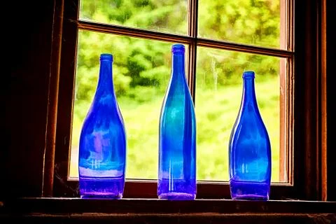 Three Blue Glass Bottles Stock Photos