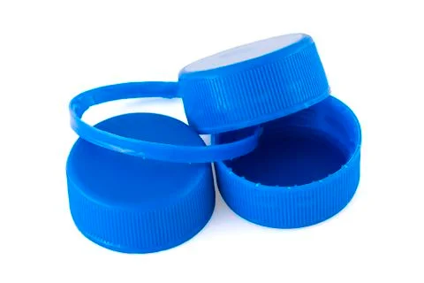 Three blue plastic bottle caps Stock Photos
