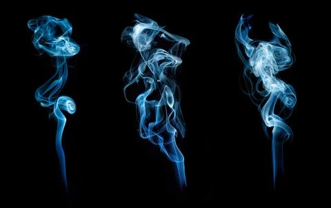 Three Blue Smoke Patterns on Black Background 스톡 사진