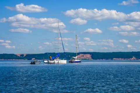 Three Boats on the River. Stock Photos