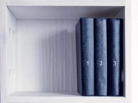 Three books Stock Photos