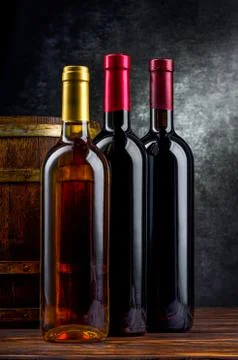 Three bottles in cellar Stock Photos