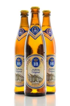 Three bottles cold light lager beer Bavarian Hofbrau Munich brewery Stock Photos