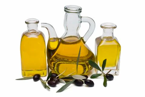 Three bottles with oil. Stock Photos
