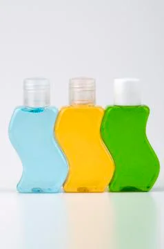 Three bottles of shampoo Stock Photos