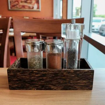 Three bottles of spices Stock Photos